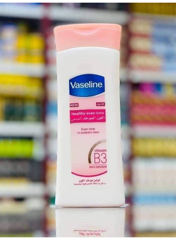 فازلين لوشن فازلين Healthy Even Tone موحد لون البشرة بفيتامين B3 – مرطب للجسم + حماية UV – رائحة منعشة – حجم كبير - Image 4